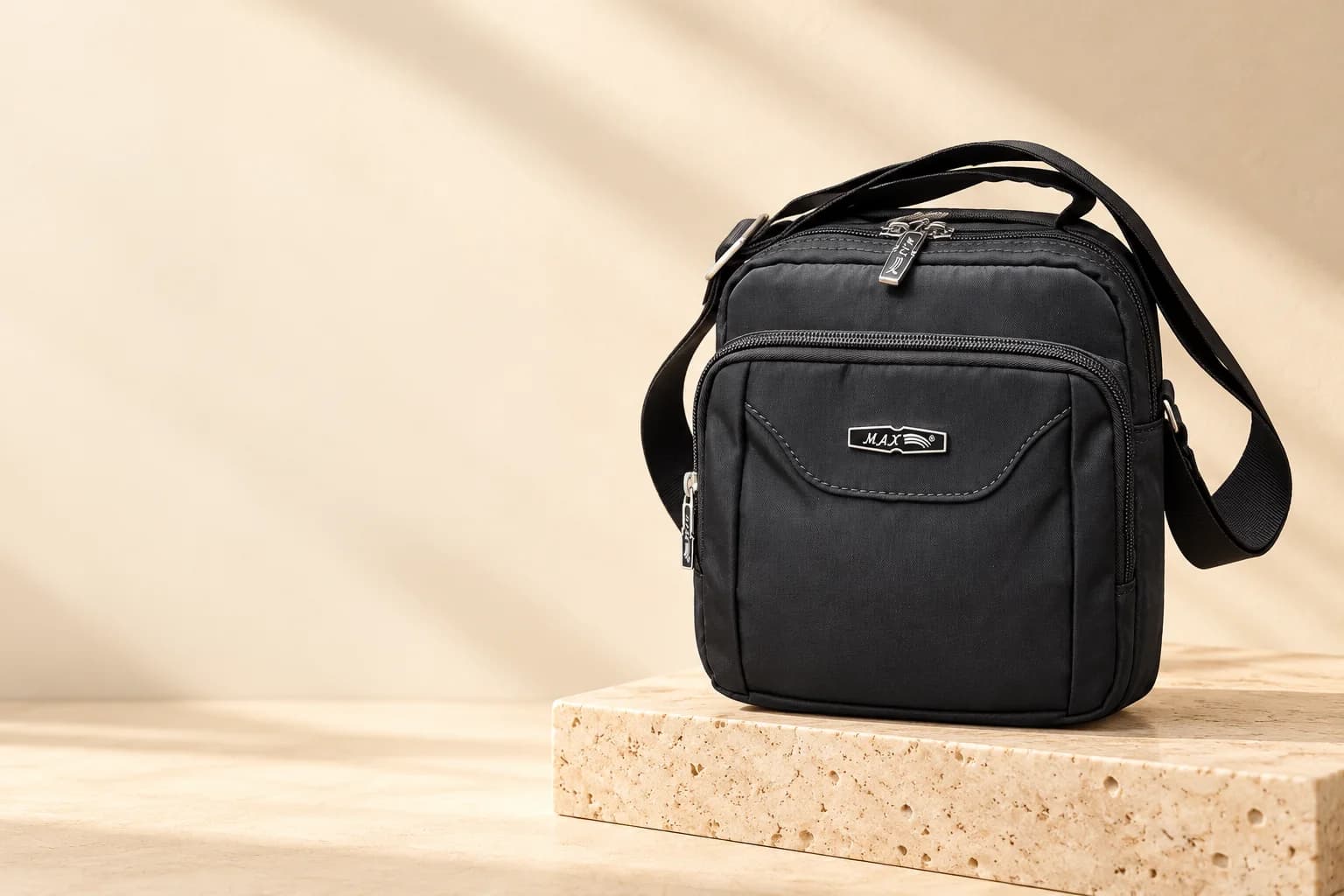 Zip Shoulder Bag on a travertine block