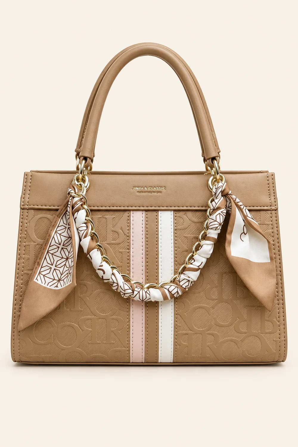 Scarf Handbag, Tan on a travertine block